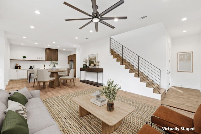 4407 Merle Dr Unit A, Austin, TX 78745 - living area with light wood-type flooring, stairs, recessed lighting, and a ceiling fan
