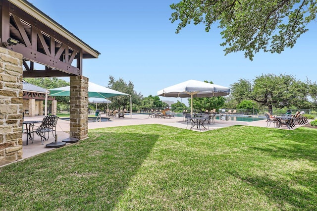 409 S Frontier Ln, Cedar Park, TX 78613 - view of grassy yard with a patio area