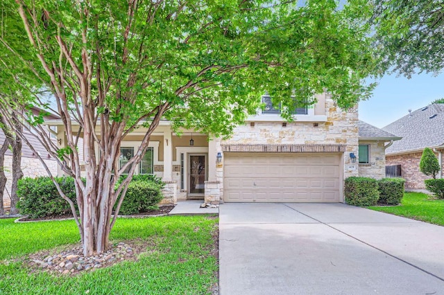 409 S Frontier Ln, Cedar Park, TX 78613 - obstructed view of property with stone siding, concrete driveway, a garage, and a front lawn