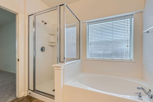 409 S Frontier Ln, Cedar Park, TX 78613 - bathroom with a stall shower, a garden tub, and plenty of natural light