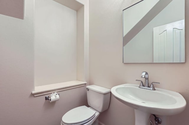 409 S Frontier Ln, Cedar Park, TX 78613 - half bathroom featuring toilet and a sink