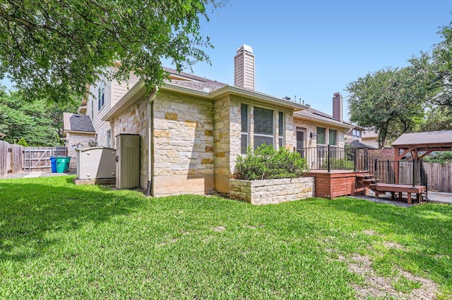 409 S Frontier Ln, Cedar Park, TX 78613 - rear view of property with stone siding, a chimney, and a gazebo