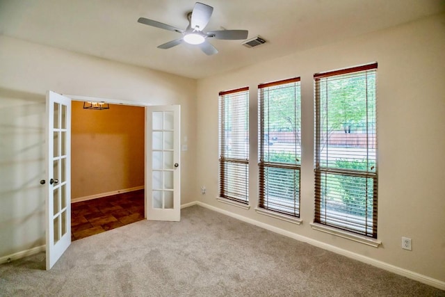 409 S Frontier Ln, Cedar Park, TX 78613 - empty room with french doors, carpet flooring, and plenty of natural light