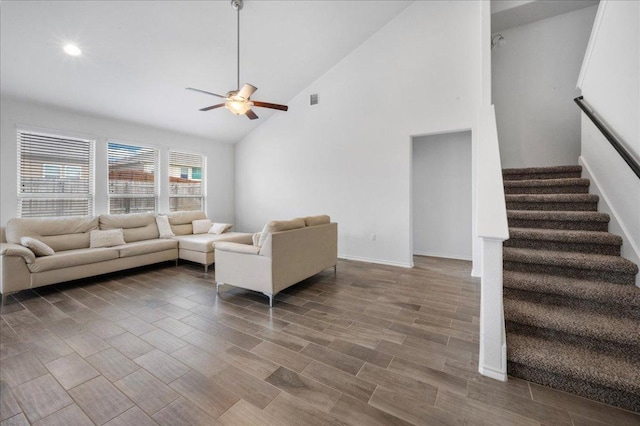 living room with ceiling fan, stairway, high vaulted ceiling, wood finished floors, and recessed lighting