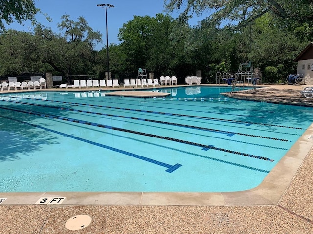 3305 Eldorado Trl, Austin, TX 78748 - community pool with view of wooded area