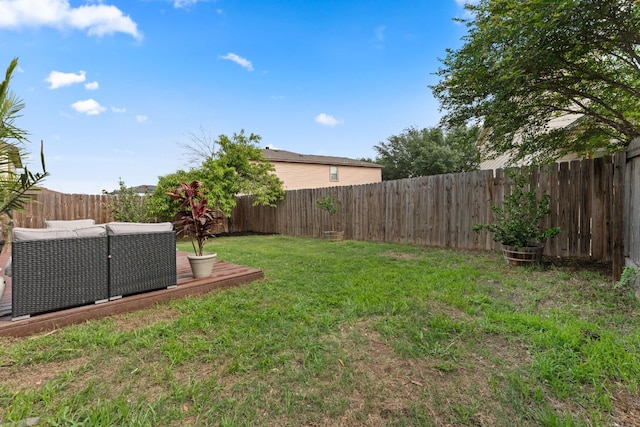 view of yard with a deck