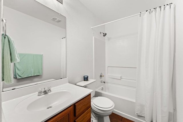 full bath with shower / bath combination with curtain, toilet, vanity, and wood finished floors
