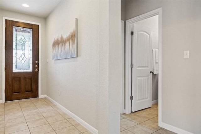801 Vaughn St, Georgetown, TX 78628 - foyer with light tile patterned floors and baseboards