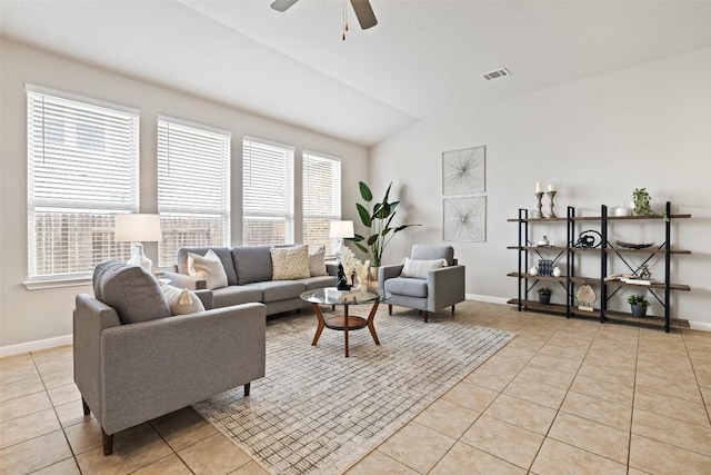 801 Vaughn St, Georgetown, TX 78628 - living room with light tile patterned flooring, vaulted ceiling, a ceiling fan, and baseboards