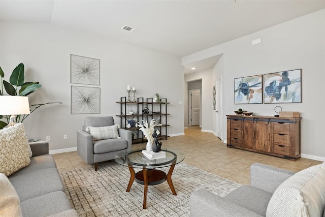 801 Vaughn St, Georgetown, TX 78628 - living area featuring light tile patterned floors, baseboards, and recessed lighting