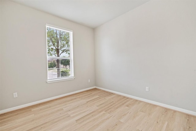 801 Vaughn St, Georgetown, TX 78628 - unfurnished room with light wood-style flooring, plenty of natural light, and baseboards