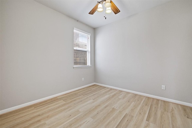 801 Vaughn St, Georgetown, TX 78628 - spare room featuring light wood-style floors, baseboards, and ceiling fan