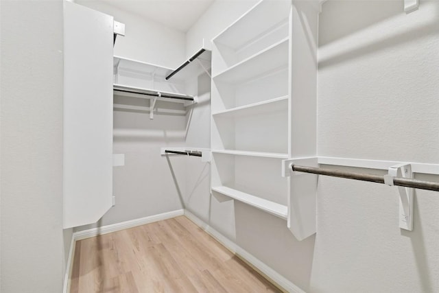 801 Vaughn St, Georgetown, TX 78628 - spacious closet with wood finished floors