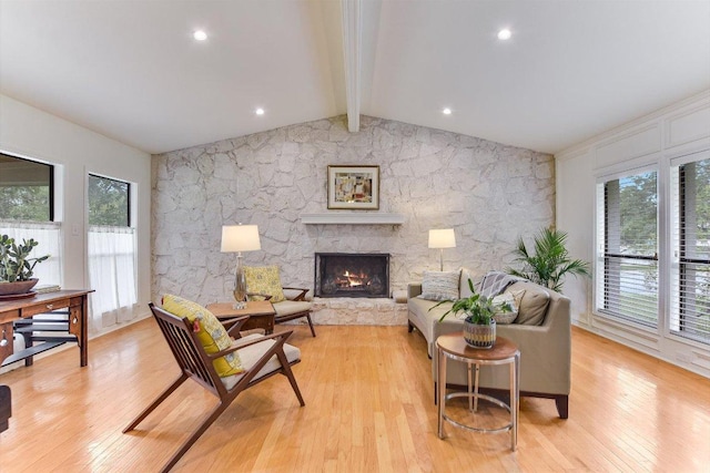 3409 Sanderling Trl, Austin, TX 78746 - living area featuring light wood-type flooring and a stone fireplace