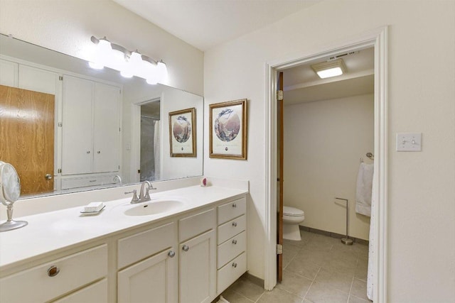 3409 Sanderling Trl, Austin, TX 78746 - bathroom with tile patterned floors, vanity, and toilet