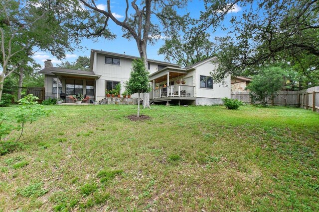3409 Sanderling Trl, Austin, TX 78746 - rear view of house featuring a wooden deck