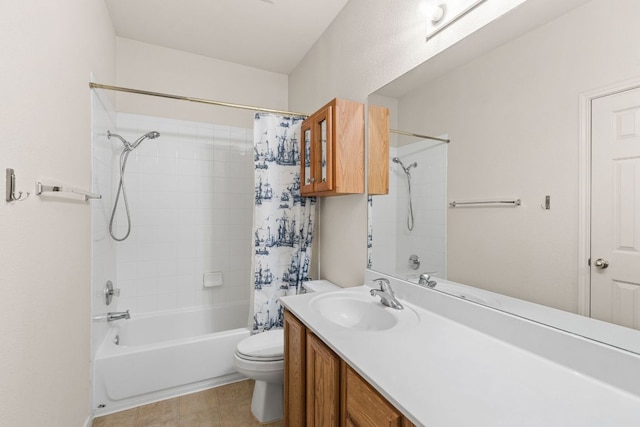 bathroom featuring shower / tub combo with curtain, vanity, toilet, and tile patterned floors