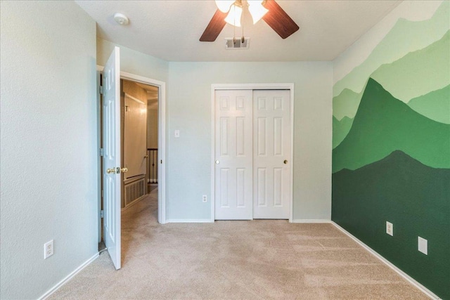 1713 Lady Grey Ave, Pflugerville, TX 78660 - unfurnished bedroom with carpet flooring, a closet, and a ceiling fan
