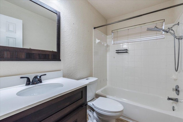 1713 Lady Grey Ave, Pflugerville, TX 78660 - full bathroom featuring a textured wall, toilet, bathtub / shower combination, and vanity