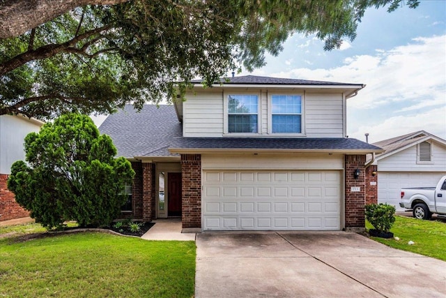 1713 Lady Grey Ave, Pflugerville, TX 78660 - traditional-style home featuring concrete driveway, a garage, brick siding, and a front yard