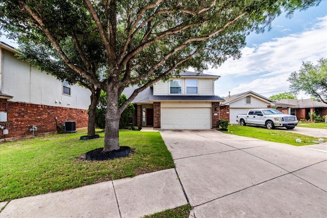1713 Lady Grey Ave, Pflugerville, TX 78660 - view of front facade with brick siding, driveway, a front lawn, an attached garage, and central AC unit