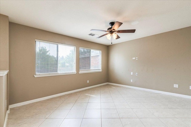 1713 Lady Grey Ave, Pflugerville, TX 78660 - unfurnished room with a ceiling fan, plenty of natural light, and light tile patterned floors