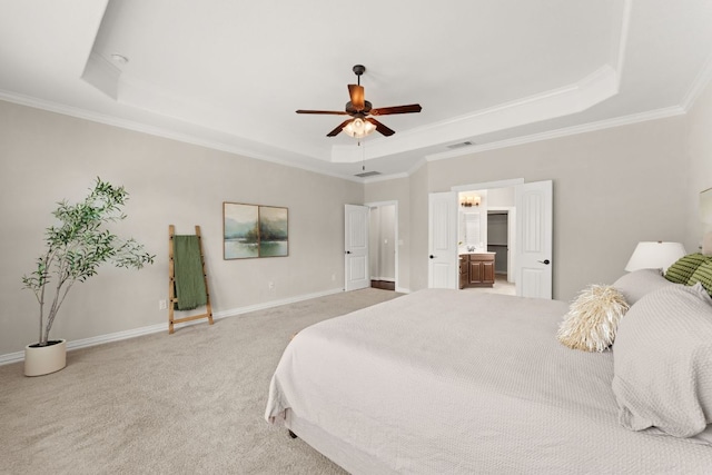 bedroom featuring a tray ceiling, light carpet, crown molding, baseboards, and ceiling fan