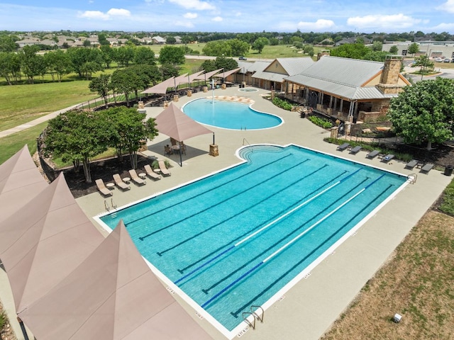 community pool with a patio
