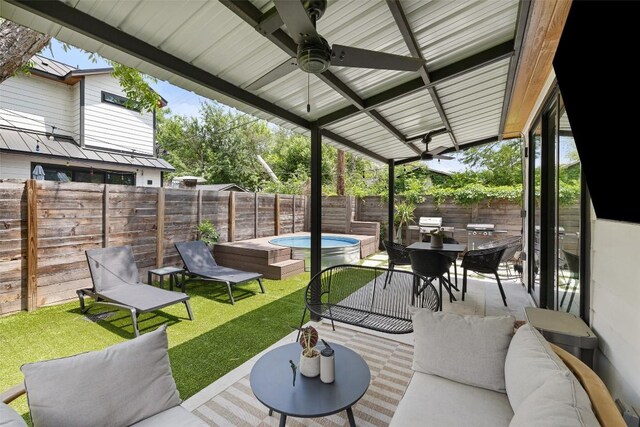 909 Mansell Ave Unit 2, Austin, TX 78702 - view of patio / terrace featuring a jacuzzi, ceiling fan, outdoor dining area, and area for grilling
