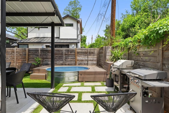 909 Mansell Ave Unit 2, Austin, TX 78702 - view of patio / terrace with a fenced backyard and area for grilling