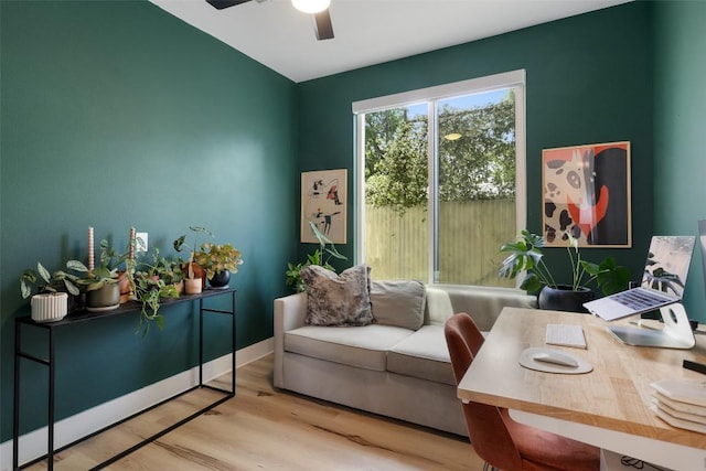 909 Mansell Ave Unit 2, Austin, TX 78702 - sitting room featuring wood finished floors, ceiling fan, and baseboards