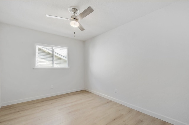 4011 Eskew Dr, Austin, TX 78749 - empty room featuring light wood-type flooring, baseboards, and a ceiling fan