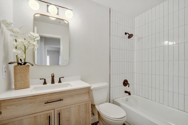 4011 Eskew Dr, Austin, TX 78749 - bathroom featuring vanity, toilet,  shower combination, and a textured wall
