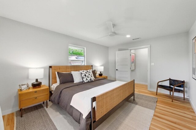 bedroom with light wood-style flooring, baseboards, ceiling fan, and recessed lighting