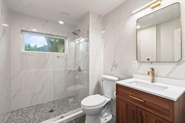 2621 W 45th St, Austin, TX 78731 - full bathroom with toilet, vanity, tile walls, and a marble finish shower