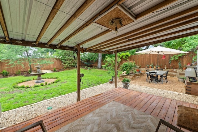 2621 W 45th St, Austin, TX 78731 - wooden deck with outdoor dining space and a patio area
