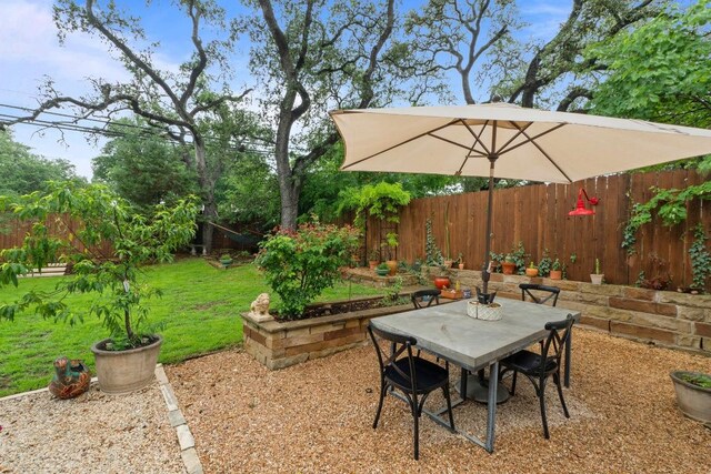 2621 W 45th St, Austin, TX 78731 - fenced backyard featuring outdoor dining area and a patio area