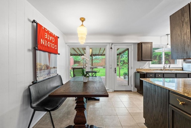 2621 W 45th St, Austin, TX 78731 - dining area featuring light tile patterned flooring