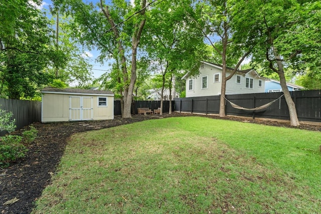605 E 43rd St, Austin, TX 78751 - fenced backyard featuring a storage shed