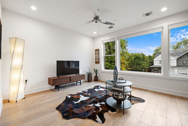1310 Choquette Dr Unit B, Austin, TX 78757 - living area featuring a ceiling fan, light wood-type flooring, baseboards, and recessed lighting