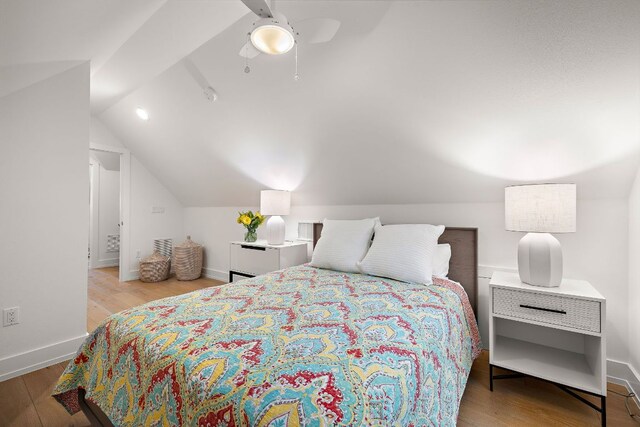 1310 Choquette Dr Unit B, Austin, TX 78757 - bedroom featuring vaulted ceiling, wood finished floors, baseboards, and a ceiling fan