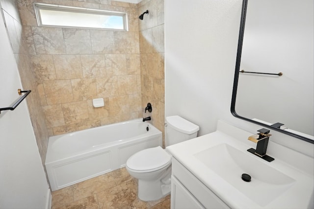 bathroom with toilet, bathtub / shower combination, and vanity
