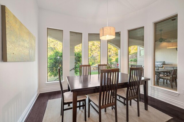 4105 Michael Neill Dr, Austin, TX 78730 - dining area featuring baseboards and dark wood-type flooring