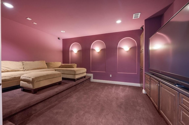 home theater room featuring dark carpet, recessed lighting, and baseboards
