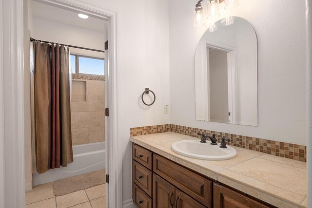 4105 Michael Neill Dr, Austin, TX 78730 - bathroom with vanity, shower / bath combination with curtain, tile patterned flooring, and tasteful backsplash