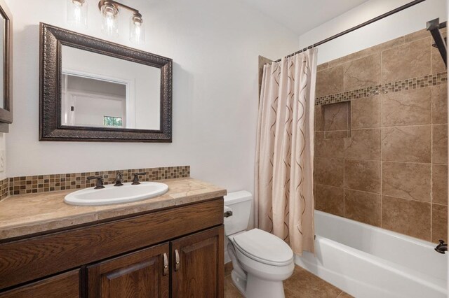 4105 Michael Neill Dr, Austin, TX 78730 - bathroom with toilet, vanity, and shower / bathtub combination with curtain
