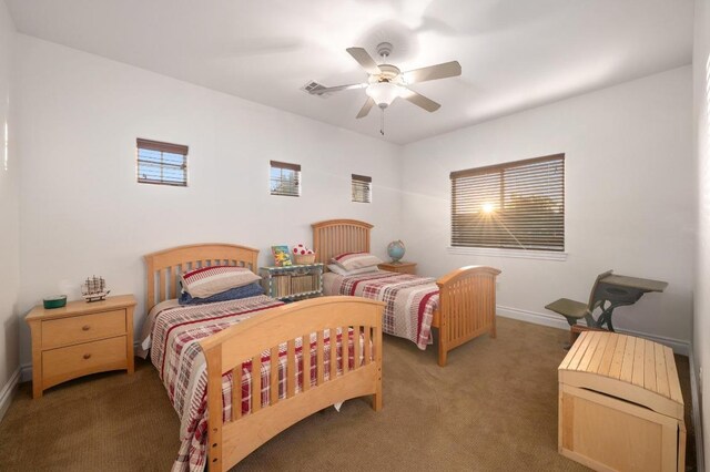 4105 Michael Neill Dr, Austin, TX 78730 - bedroom with carpet flooring, baseboards, and ceiling fan