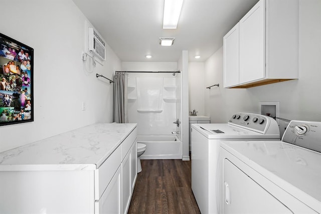 3656 Rr 2657, Copperas Cove, TX 76539 - washroom with washing machine and clothes dryer, dark wood-style flooring, an AC wall unit, and recessed lighting