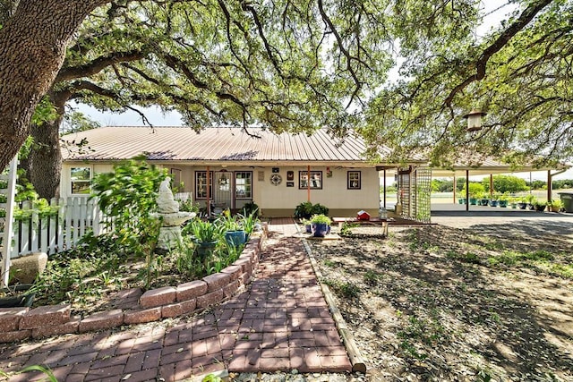 3656 Rr 2657, Copperas Cove, TX 76539 - view of front of property with fence, metal roof, and a carport