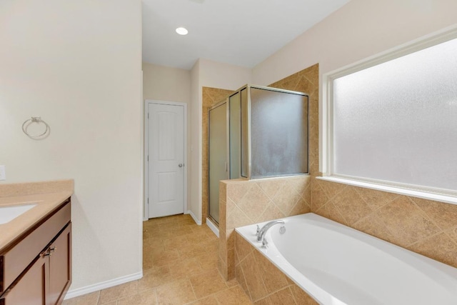 3624 Anchor Bay Dr, Pflugerville, TX 78660 - full bathroom featuring a shower stall, a bath, vanity, and baseboards